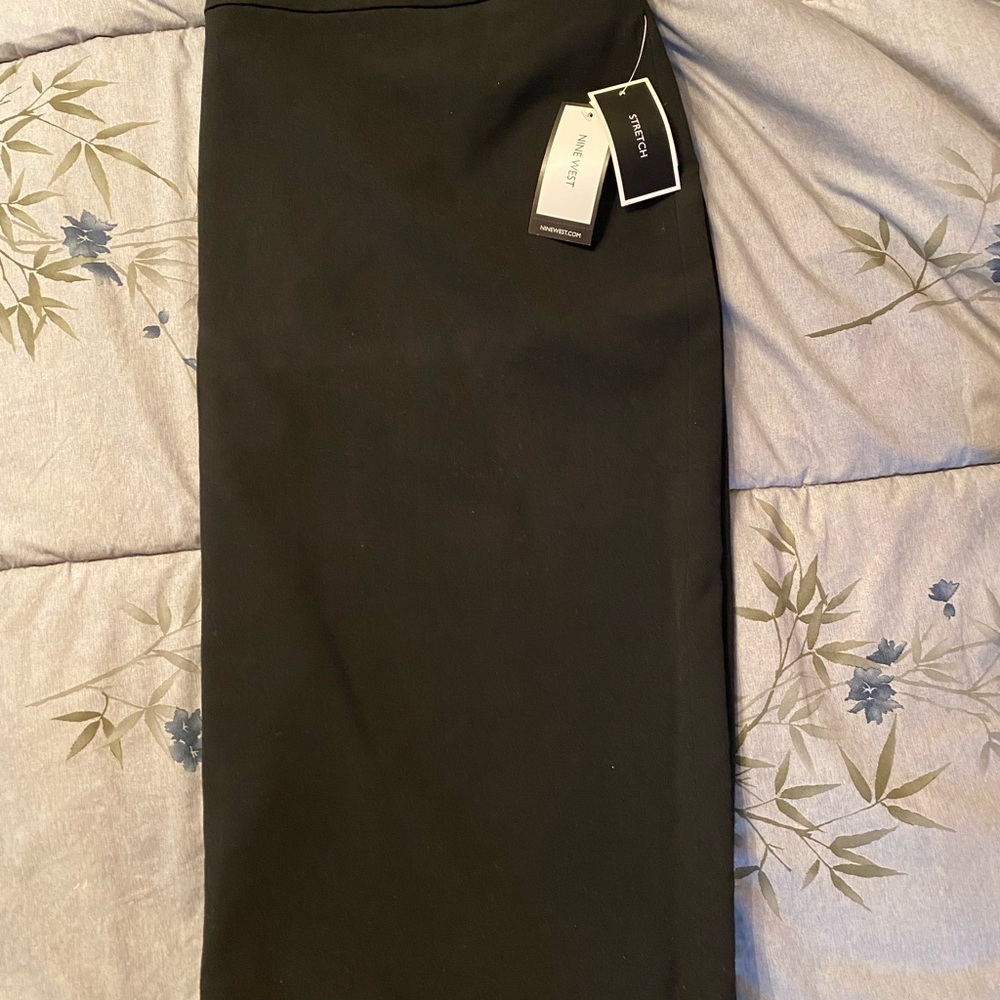 Black suited skirt, matching jacket